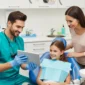 Family meeting with a dentist at a modern dental clinic in Coquitlam